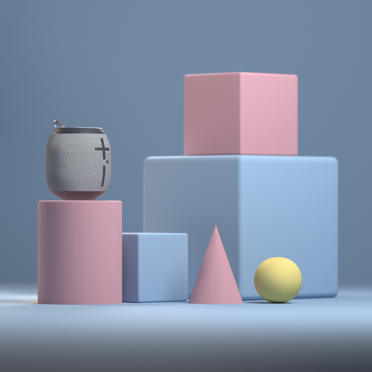 A collection of pastel pink and blue geometric shapes arranged artistically on a light blue background.
